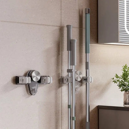 Space-saving holder for brooms and tools – Quick to install, no drilling required